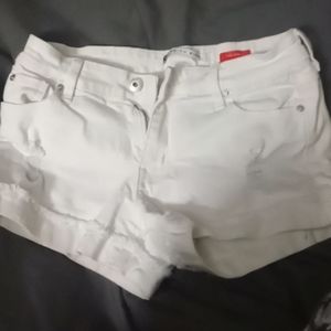 Pink distressed shorts